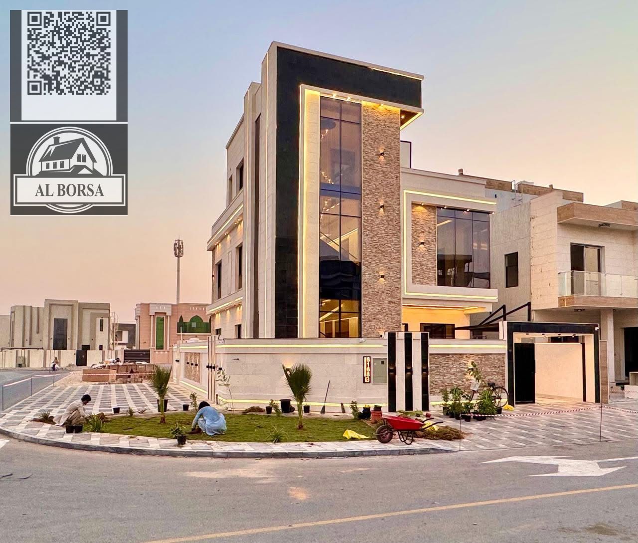 For sale in Al Yasmin, Ajman: a luxurious villa with 5 master bedrooms, a majlis, a living room, and a swimming pool.