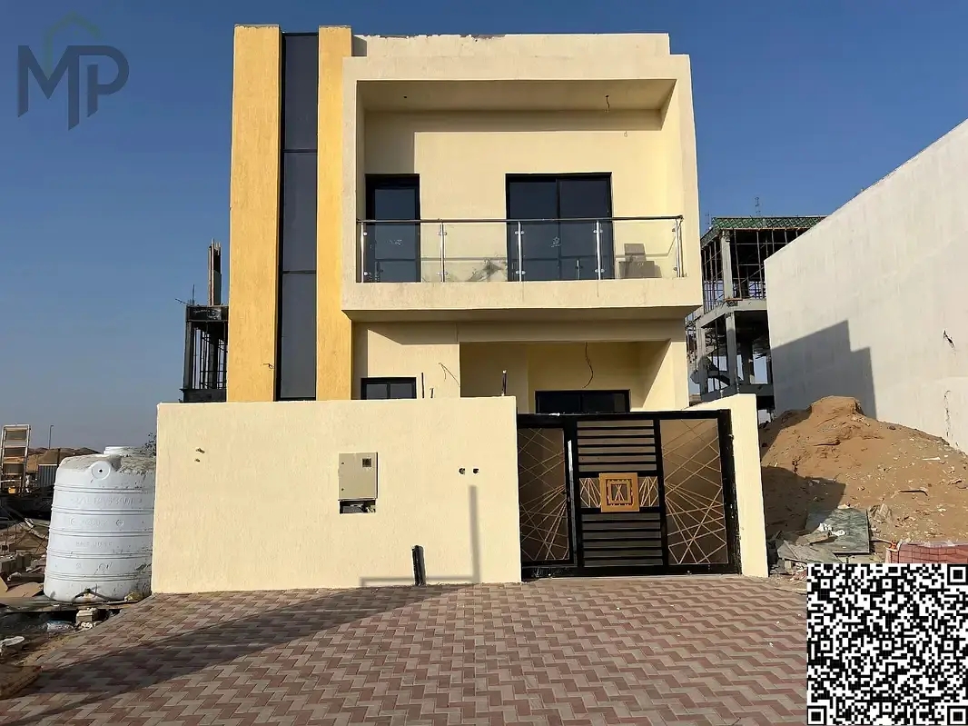 Modern villa with 5 bedrooms and a roof for sale in Al Helio 2, Ajman, including registration and ownership fees.