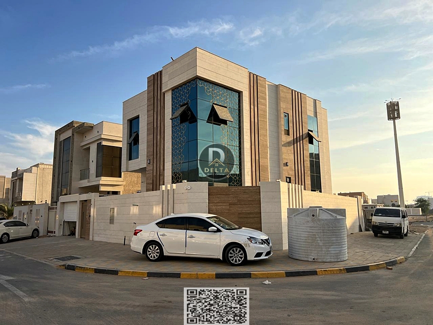 Corner villa for sale, custom-finished, negotiable price, 25-year insulation warranty, prime location in Al Zahia, freehold ownership for all national