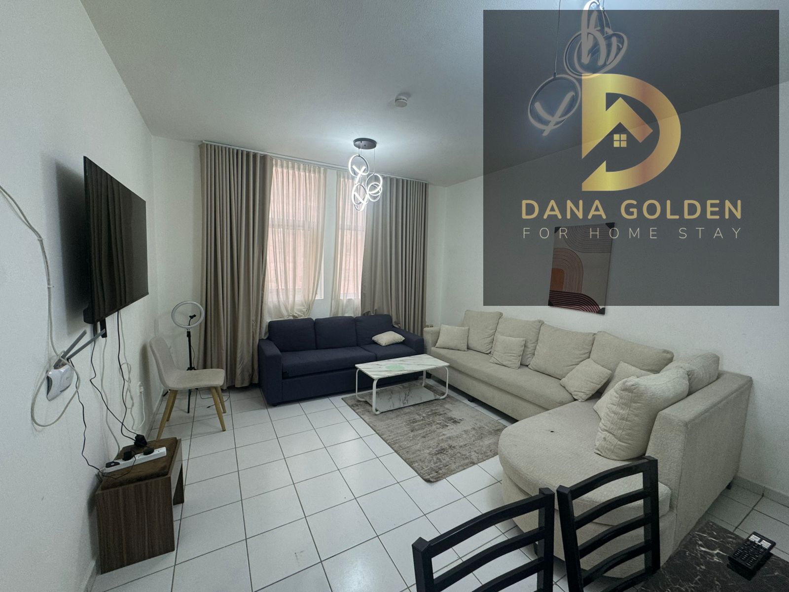One bedroom and living room in Sharjah, Al Taawun Street. Clean furnishings and ample space.