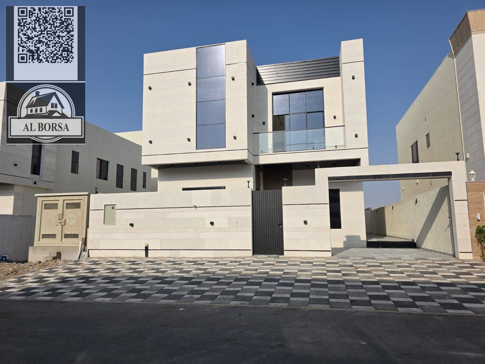 Villa for sale in Al Helio 2, Ajman. 5 master bedrooms, majlis, living room, maid's room, central air conditioning.