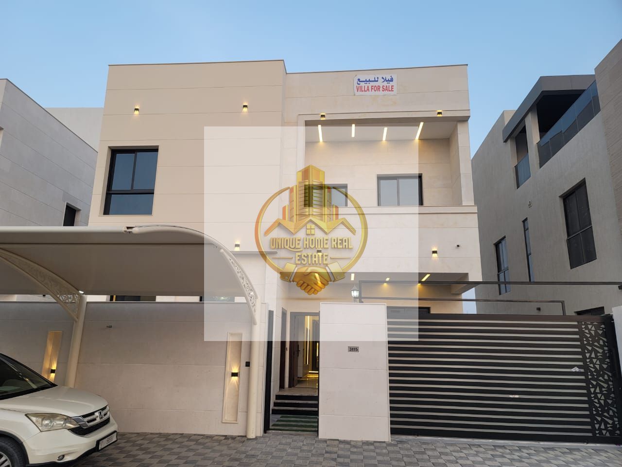 For Sale – Villa in Al Bahia – Ajman | 2 Floors + Roof | 6 Master Bedrooms | Majlis + 2 Living Rooms | Main Kitchen + Preparatory Kitchen | Elegant