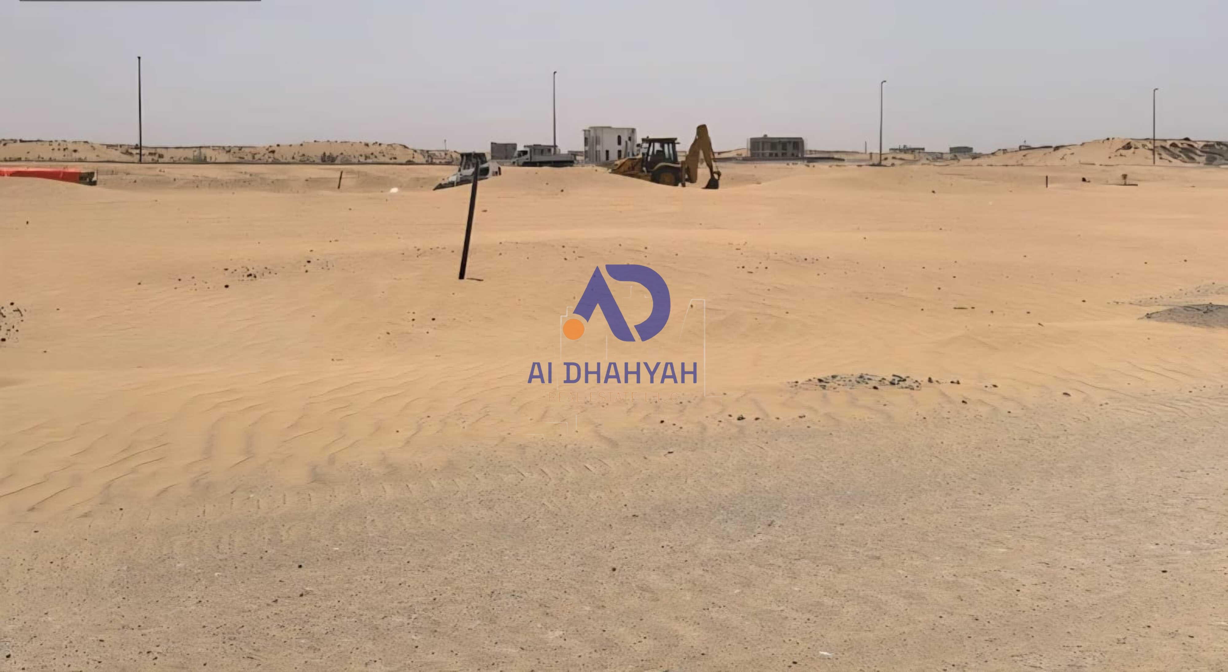 Commercial land for sale in Al Ruwaidat project, permit G+7