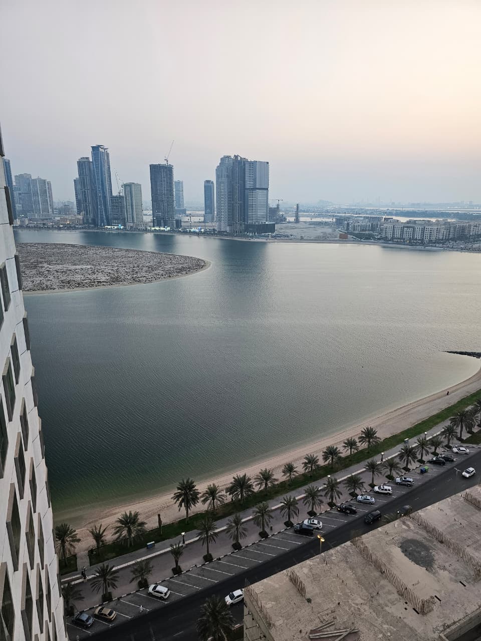For Sale Apartment in Al Rand Tower with a side view of the lake