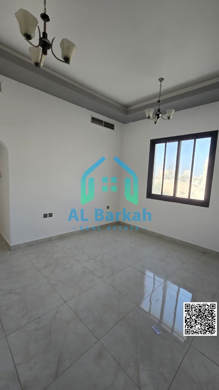 One-bedroom apartment with a living room for annual rent – behind Grand Mall Al Rashidiya 3