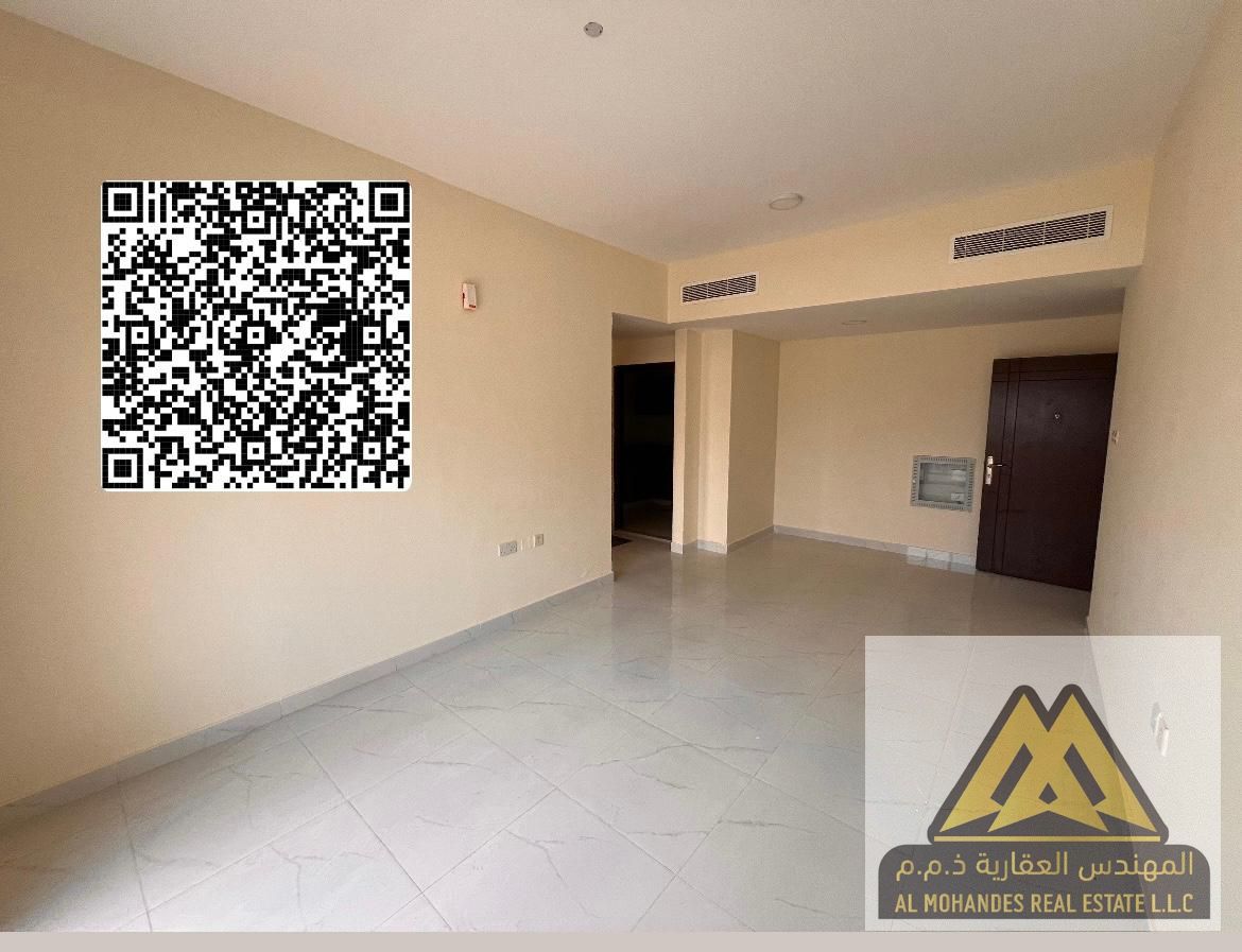 1BR apartment in Al Nuaimiya 3, prime location behind Al Safeer and opposite Sharjah, spacious layout with central AC, annual rent AED 29,000