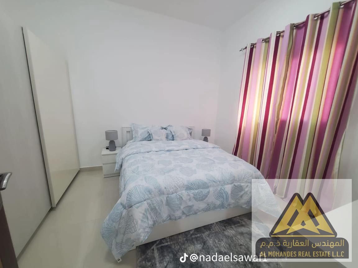 A large, fully furnished one-bedroom apartment is available in a brand-new building in Al Rashidiya, located next to Rashidiya Towers.