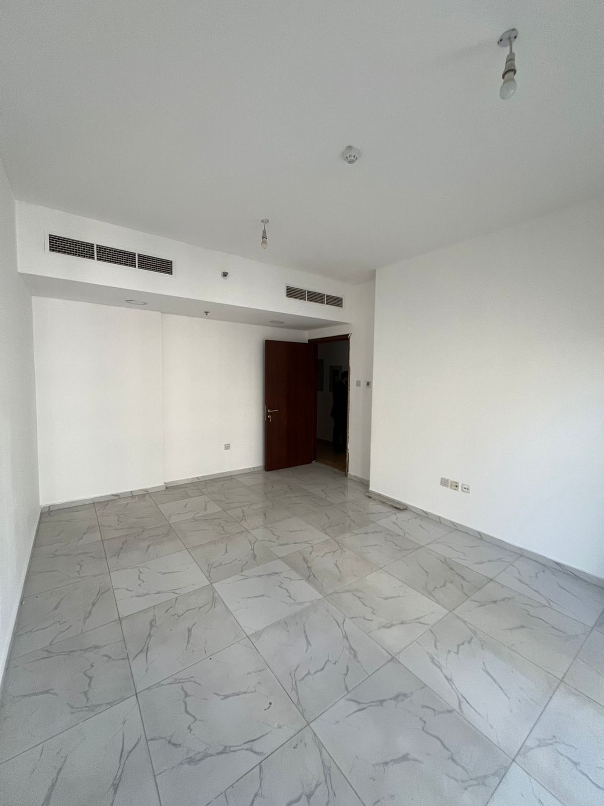 2BR apartment in Al Majaz 3 with balcony, two bathrooms, gym, pool, and parking. Great location for 50K.