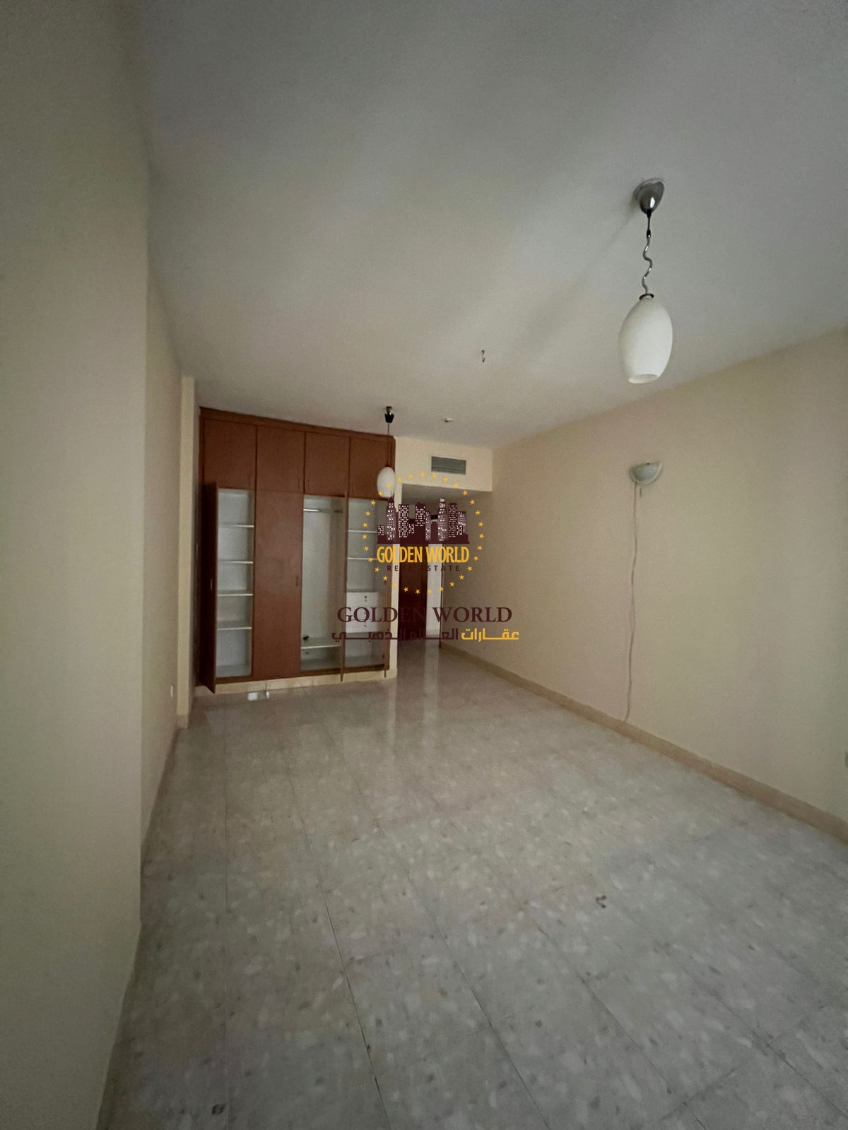 2BR hall in Al Majaz 3 with two balconies, built-in wardrobes, two bathrooms, and master bedroom. Spacious and ready. Rent: 40,000.