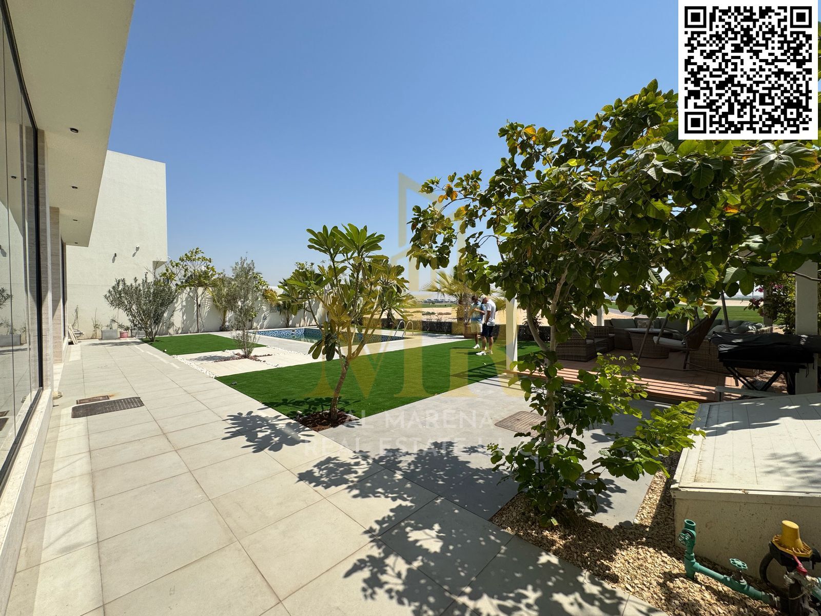 In Al Zorah, on a 10,000 sq ft plot, including electricity, water, and furnishings, with a lake view and private pool.
