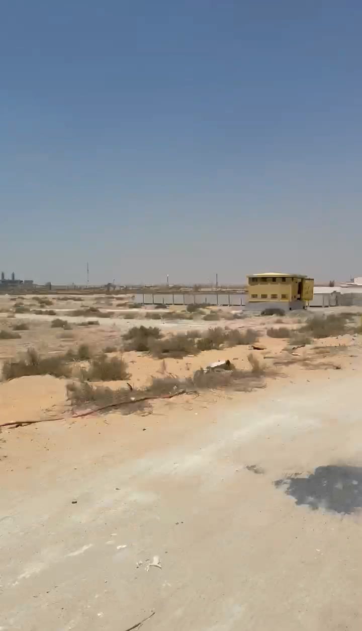 Land for sale in Al Sajaa Industrial Area, opposite Al Hanoo Al Jalil, on two streets in Sharjah.