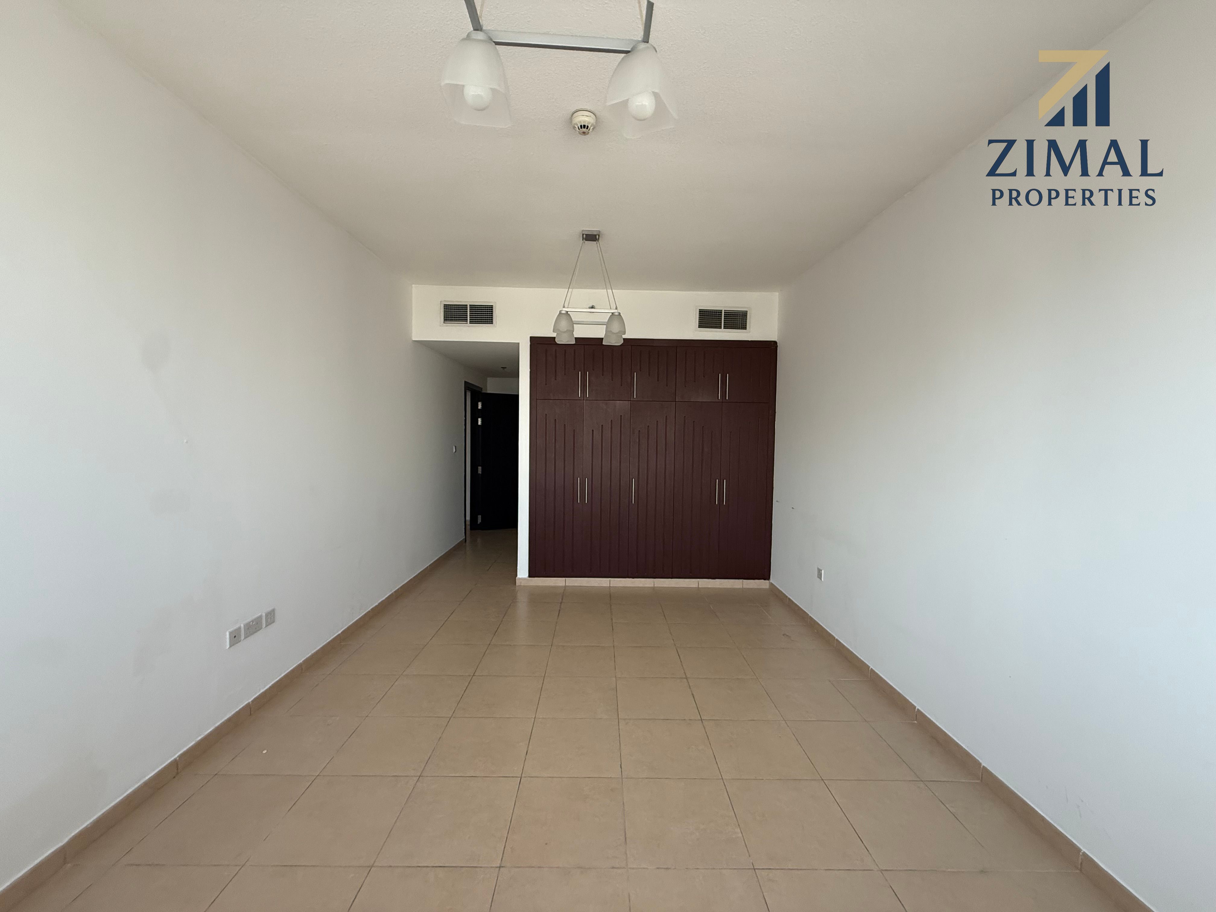 Premium 2BHK with Road View | Chiller Free | Pool & Gym Access