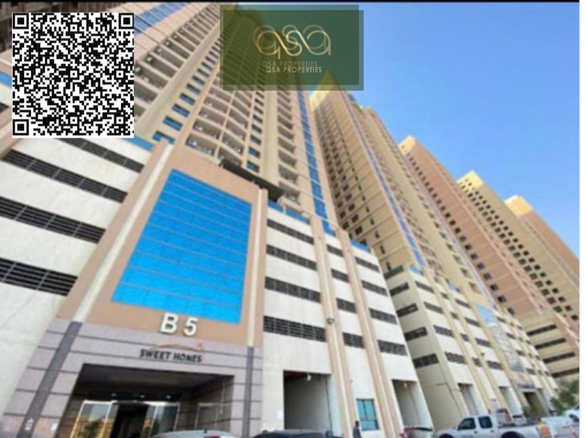 FRONT VIEW 2BHK APARTMENT AVILABLE FOR SALE PARADISE LAKE TOWER B5 EMIRATES CITY AJMAN WITH PARKING
