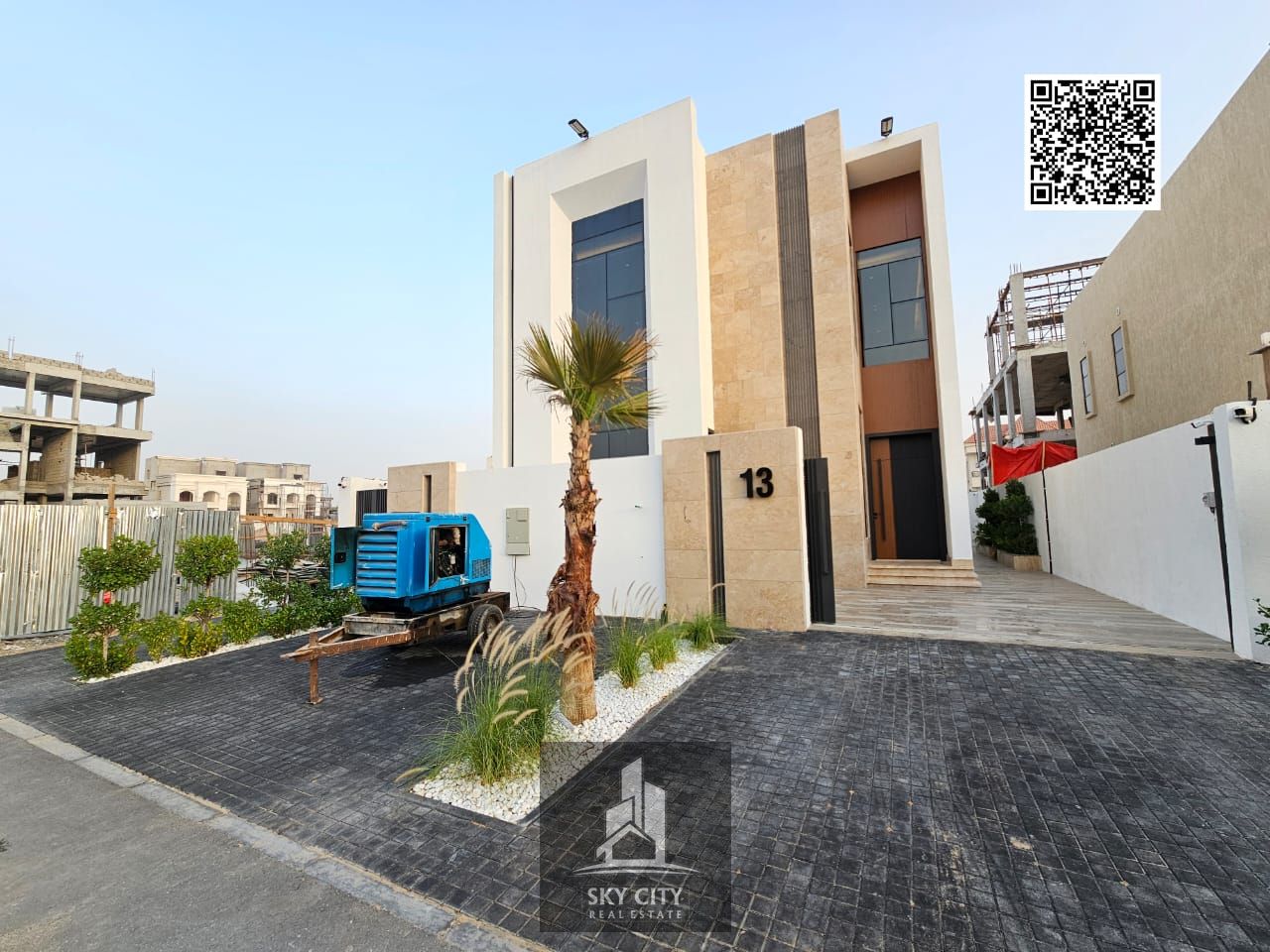 Villa for sale in Al Helio 2, Ajman. Super duplex with high-end finishes, registration fees included.