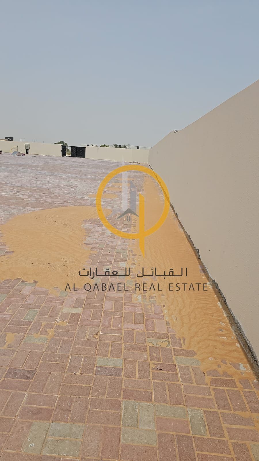For rent: A plot of land in Al Saja’a on a 97-meter main road in Emirates Industrial City, offered at a good price.