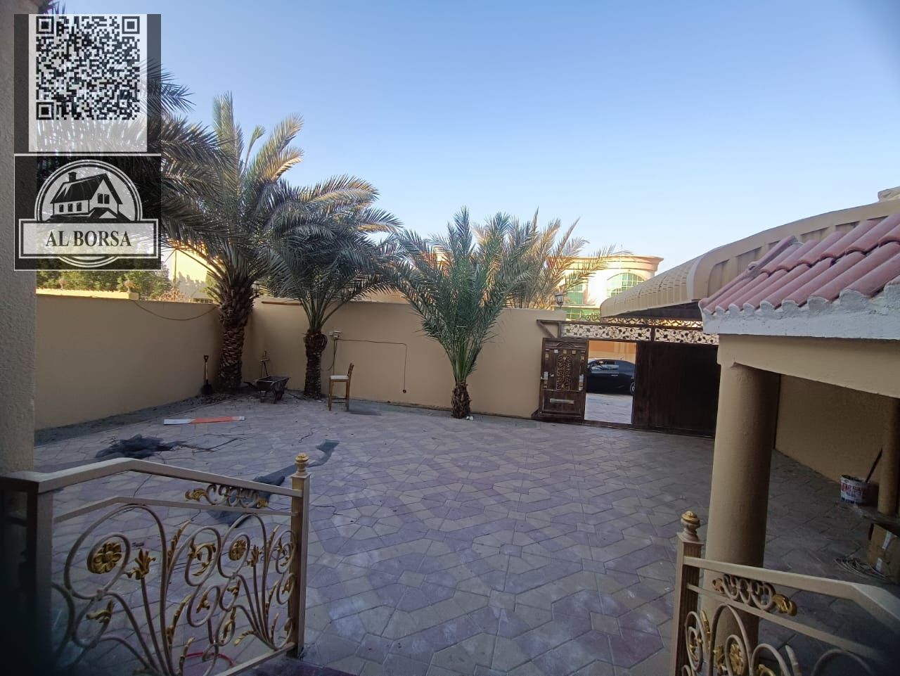 For rent in Al Rawda 1, a classic villa with 5 bedrooms, a living room, a majlis, and two kitchens. Price: 110,000 AED