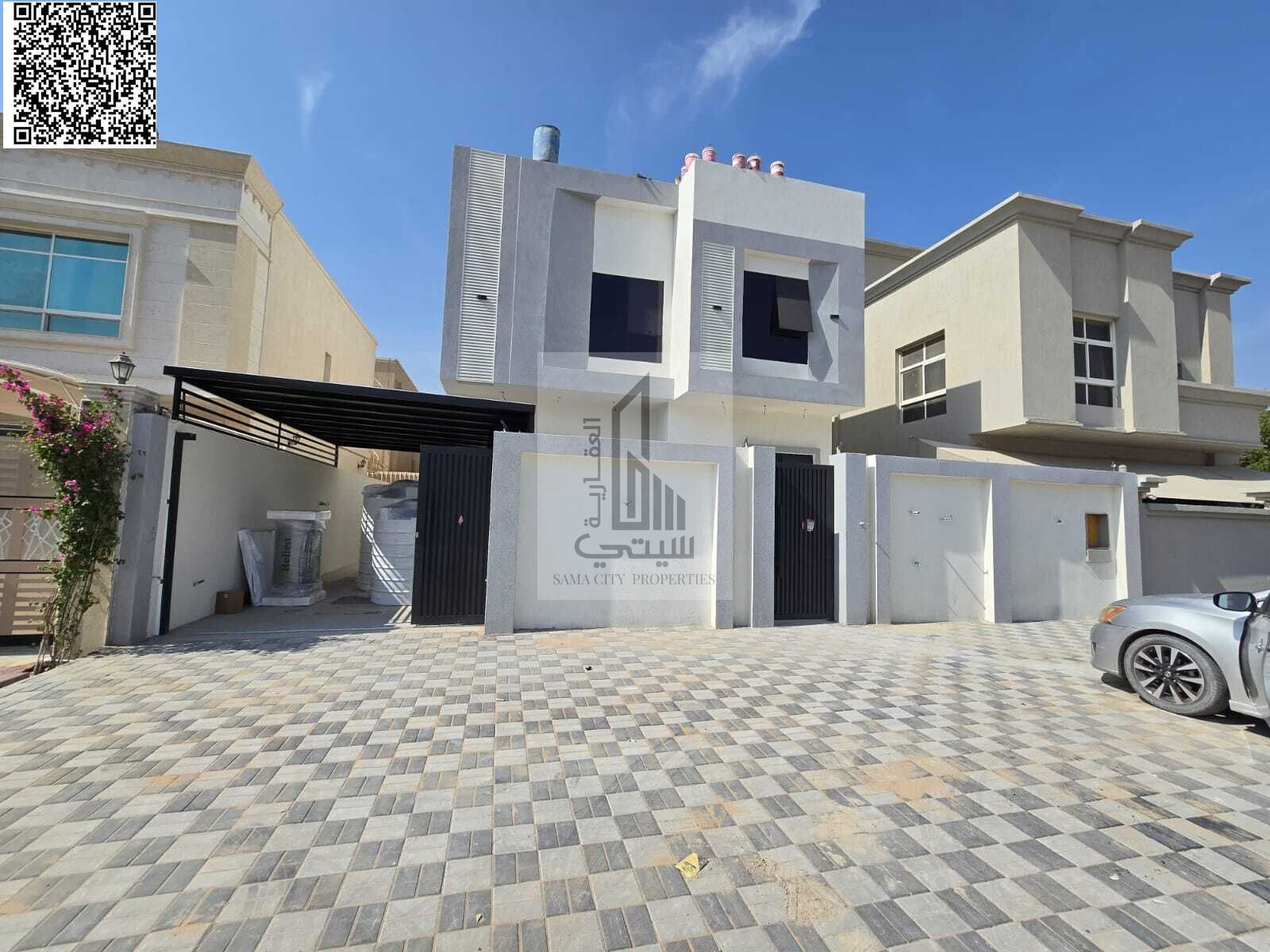 Luxury villa for sale in Ajman, including registration fees.