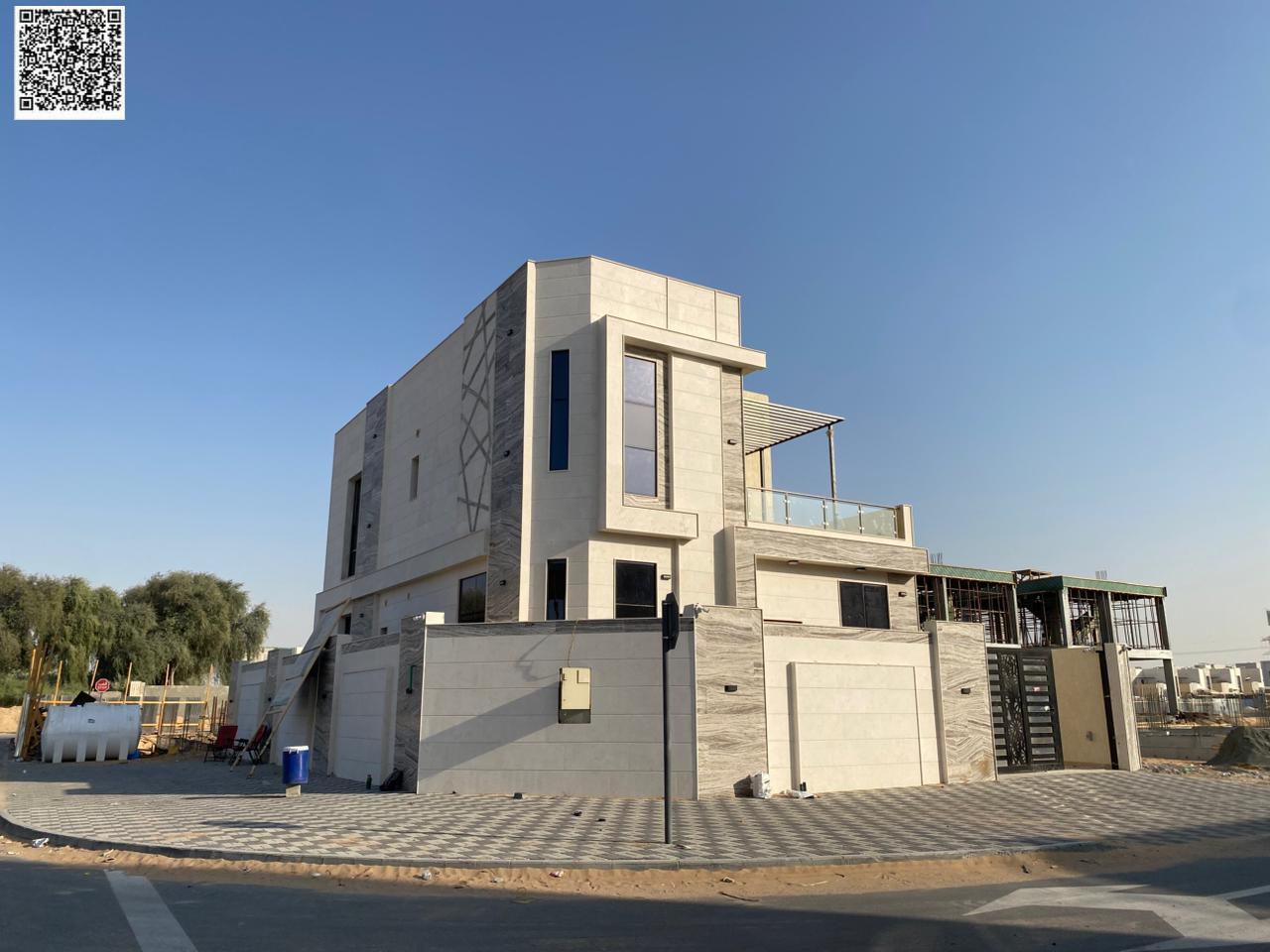 Villa Corner, price inclusive of registration and ownership fees, on the main street, ready to move in, in one of Ajman's most prestigious areas, free