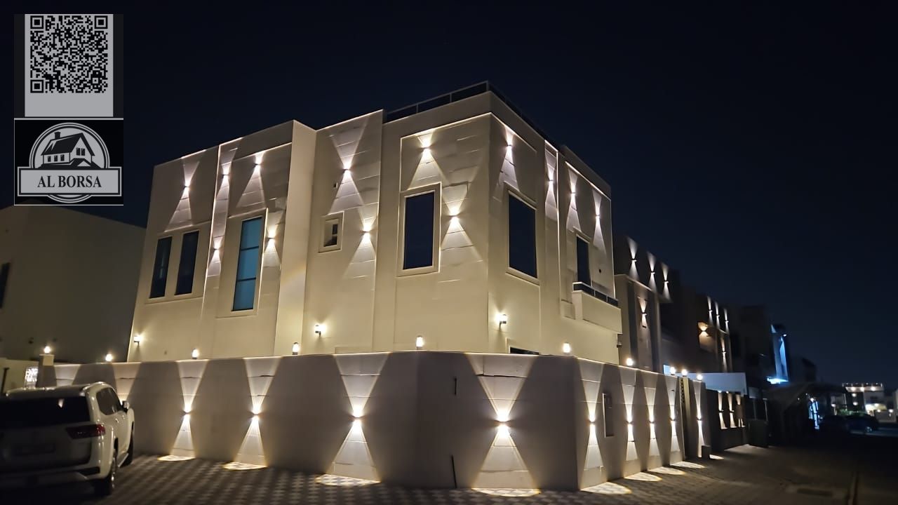 Corner Villa for Rent in Ajman, Al Yasmin 5 Master Bedrooms, Living Room, Majlis, Kitchen, Maid's Room, and a Large Yard.