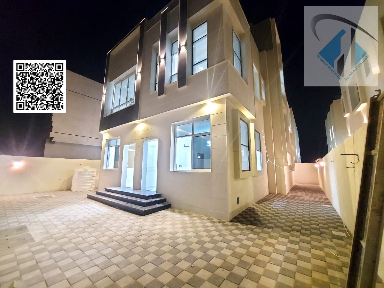 Villa for sale in Al Helio, Ajman. 5 master bedrooms, majlis, living room with kitchen, and maid's room. Spacious area.