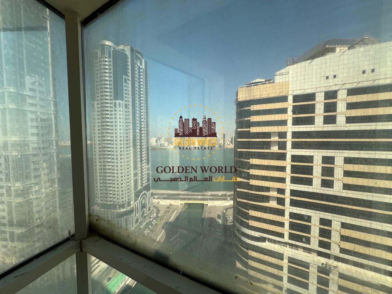 3BR + living room in Majaz 3 Qasba, with a balcony, 2 bathrooms, and available parking. Prime location near services. Annual rent: 70,000 AED.