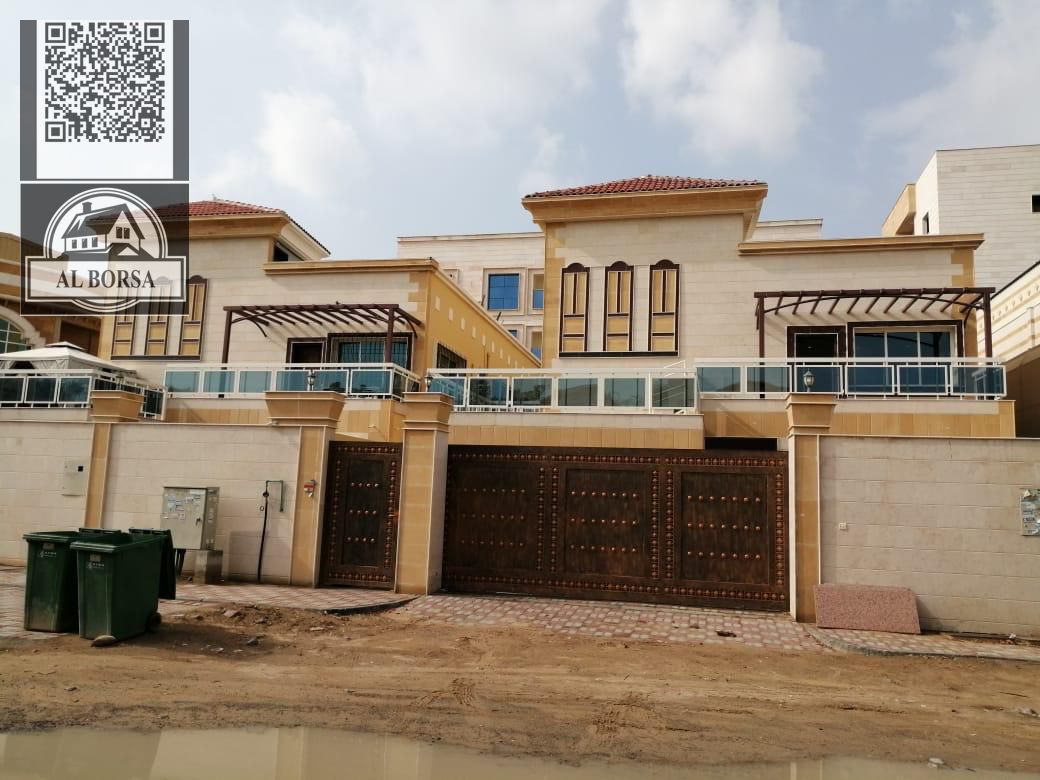 For sale in Al Muwaihat: 2 villas, 6 master bedrooms, majlis, living room, and maid's room