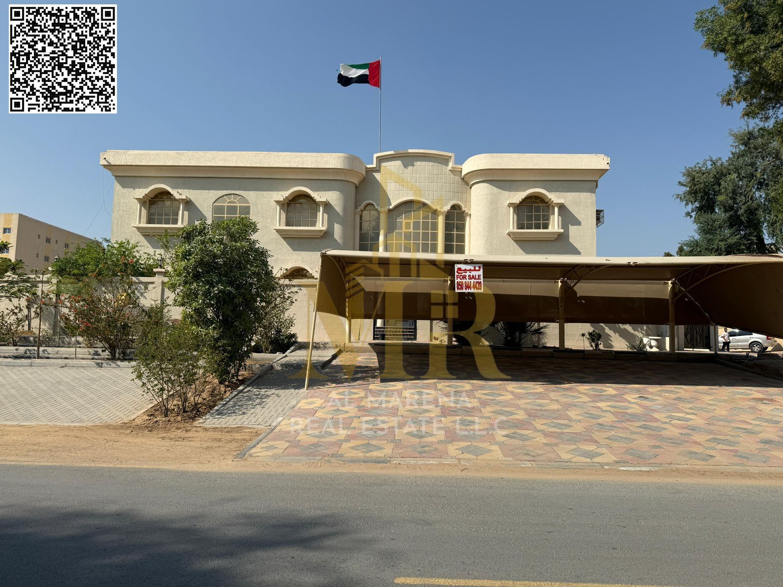 For sale: Residential/commercial villa in Ajman, Al Muwaihat area. Prime location, 10,000 sq ft. Price includes electricity, water, and air conditioni