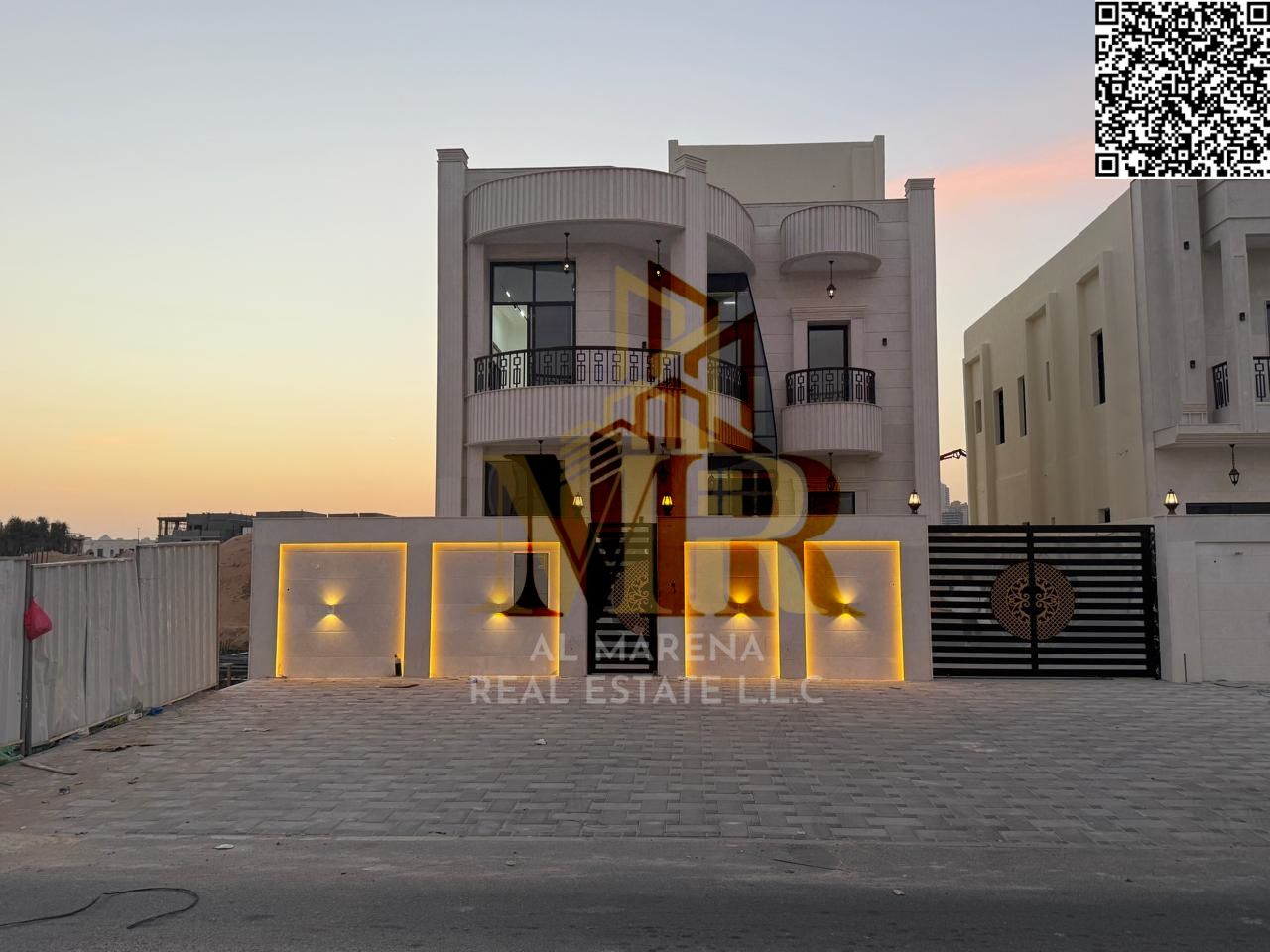 A luxurious super deluxe villa for sale in Al Helio 2, Ajman, at an attractive price including registration and ownership fees. Located in the heart o