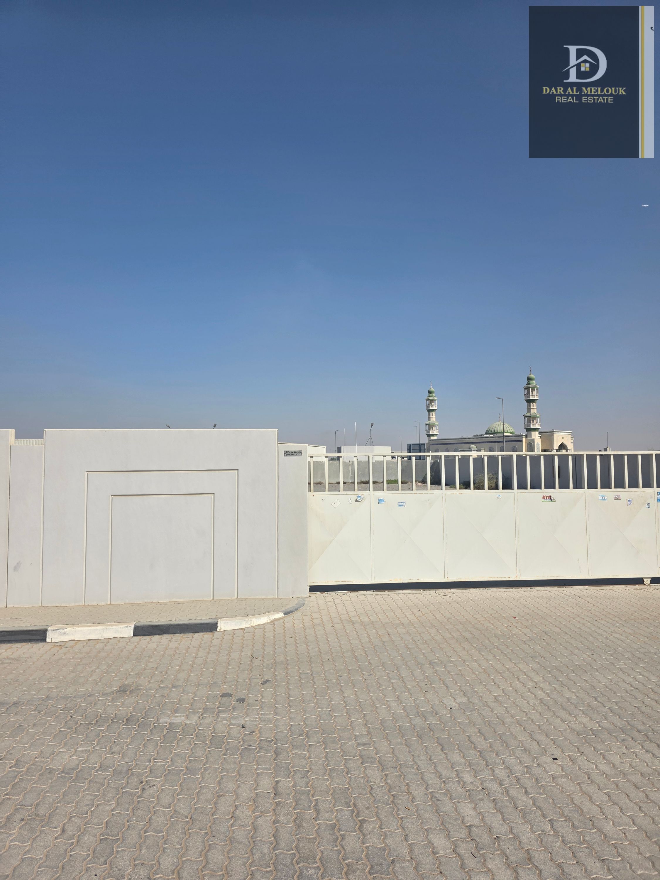 Corner plot on 3 paved streets – with electricity in Al Sajaa, ideal for industrial projects