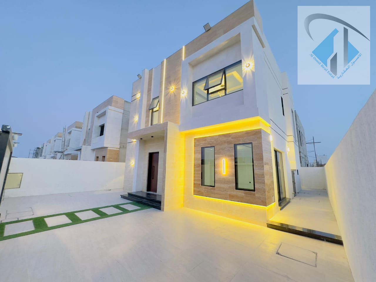 Villa for sale in Ajman, Al Zahiyah area. The villa consists of a ground floor (G+1), 3 master bedrooms with built-in wardrobes, a majlis (formal sitt