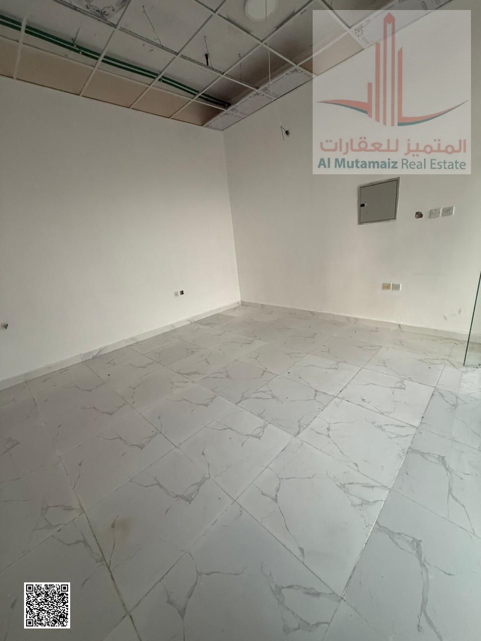 Commercial shop for annual rent in Ajman, in Ahmed Tawfiq Building, Al Rawda 3. Rent is AED 13,000, security deposit by check.