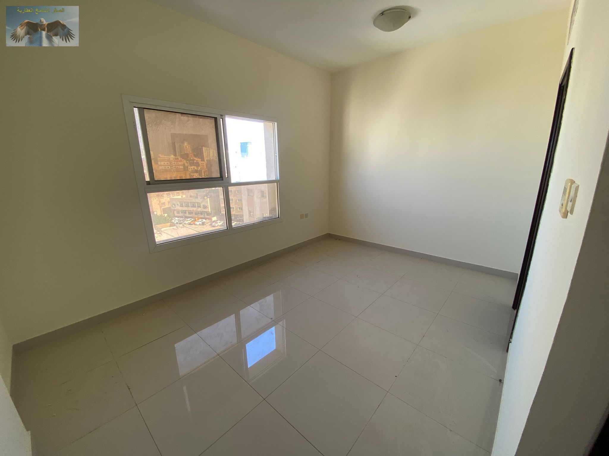 Studio for Annual Rent in Al Nuaimiya 3, College Street, with semi-separate kitchen, modern bathroom, excellent lighting and ventilation, central loca