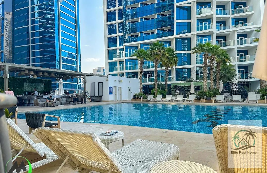 “Chic Canal-View Studio at DAMAC Maison Prive Monthly Rentals, Pool, Gym & Dubai Vibes!”