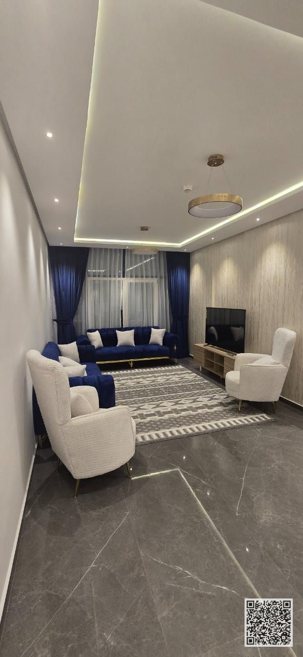 For monthly rent in Ajman, two-bedroom apartment with a balcony open view, fully furnished with elegant furniture and a fully equipped kitchen