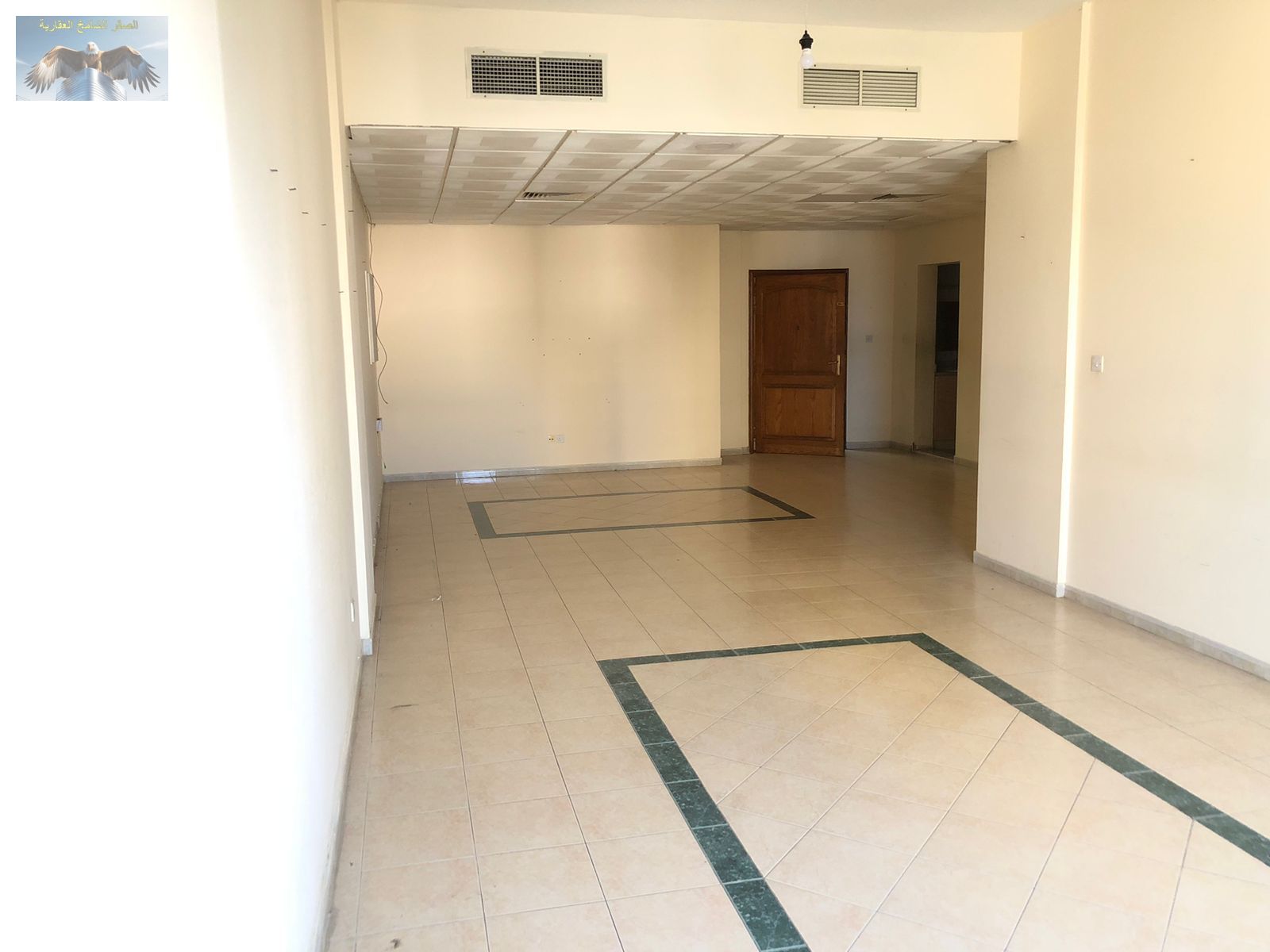Spacious 2BHK on Old Airport Road opposite Ajman One Towers, prime location near all services, only AED 38,000 yearly in 6 flexible payments