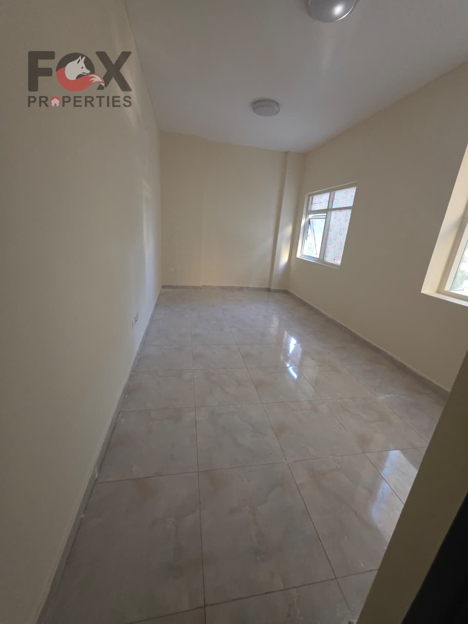 ChatGPT said: Spacious master-bedroom apartment with living room for rent. Prime location near Ajman University, close to all services. Second tenant