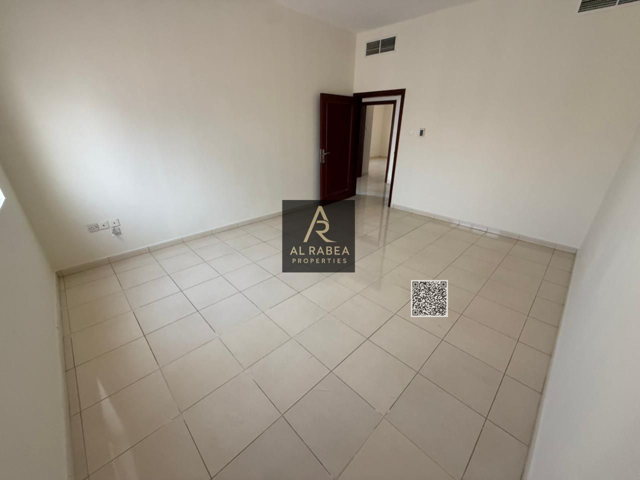 Balcony overlooking Al Ittihad Street - good ventilation and natural light