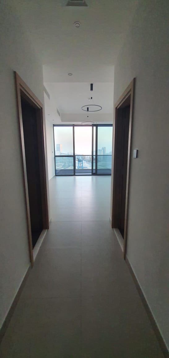 For Sale 1-Bedroom Apartment with a Stunning Side View of the Lagoon in Al Mamzar
