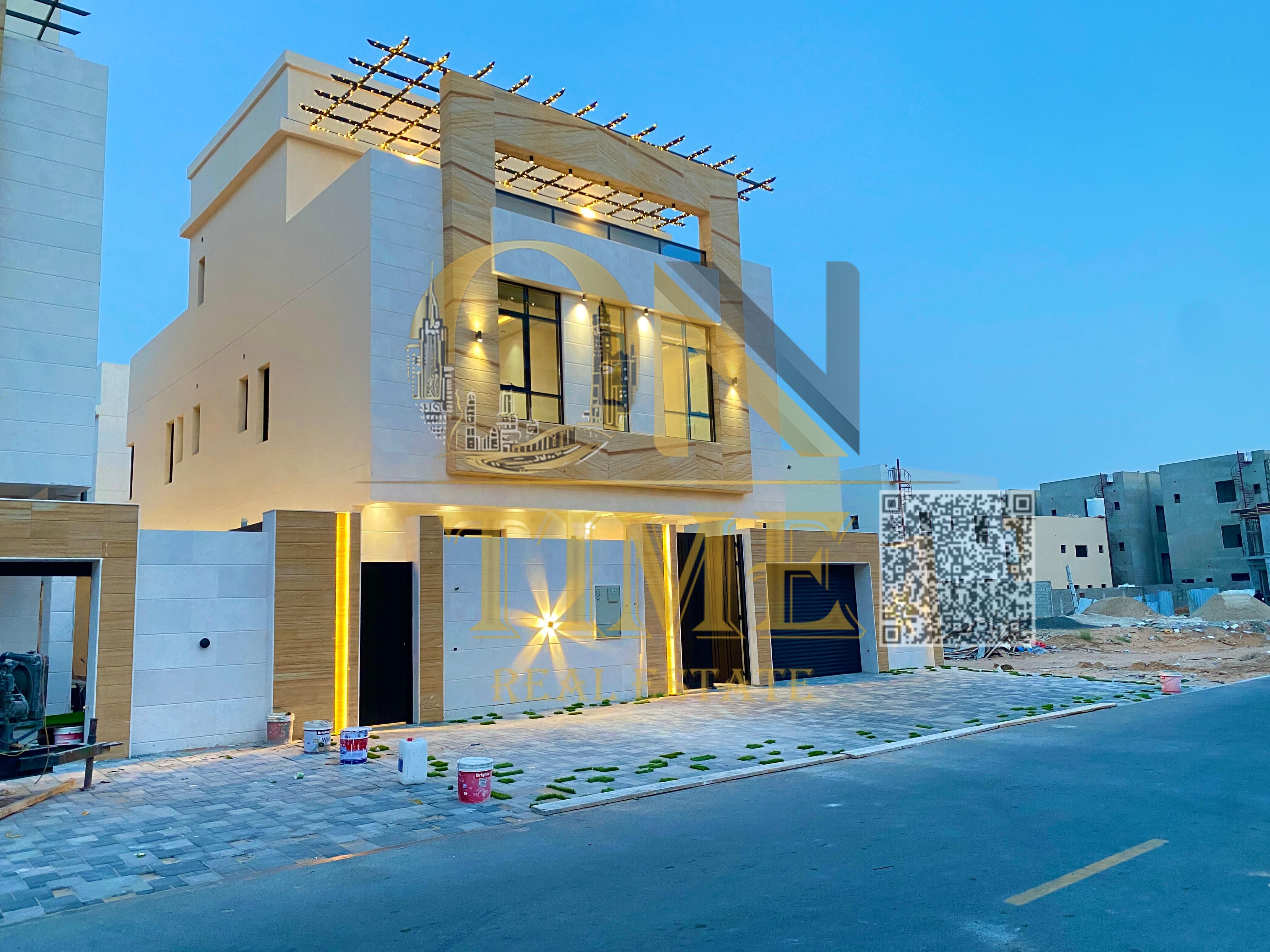 A 3-story villa with 5 master bedrooms, ultra-deluxe finishes, and a private pool in Al Helio 2, Ajman, near Mohammed Bin Zayed Road, at a price inclu