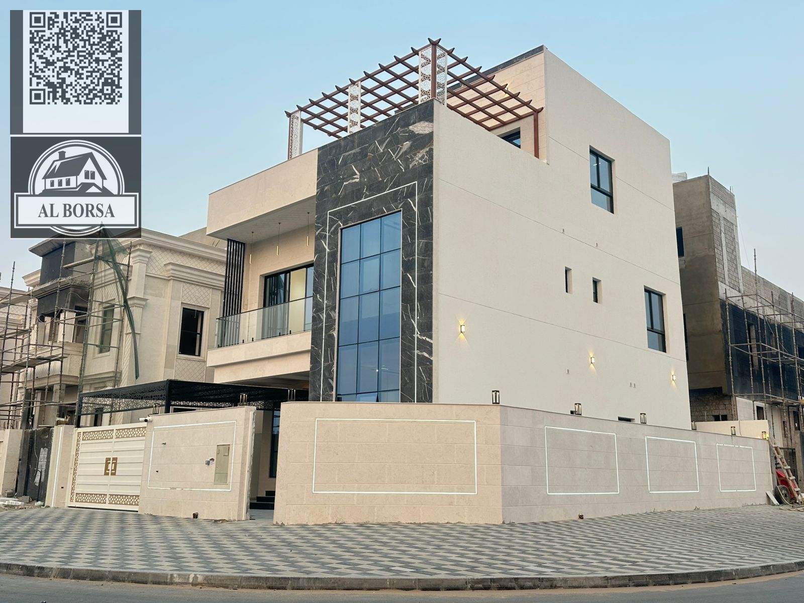 For sale in Al-Haliyo 2, a villa including fees, central air conditioning, two floors and a roof, 7 rooms, a majlis, 2 living rooms, a maid's room