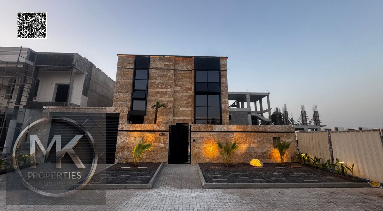 Luxury Villa for Sale in Al Alia – Modern Design & Prime Location Elegant stone façade Modern entrance