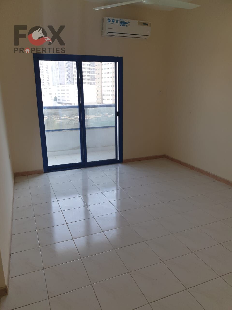 One bedroom and living room for annual rent in Al Rashidiya 3, in a prime location close to services, featuring a balcony and two bathrooms, in a clea