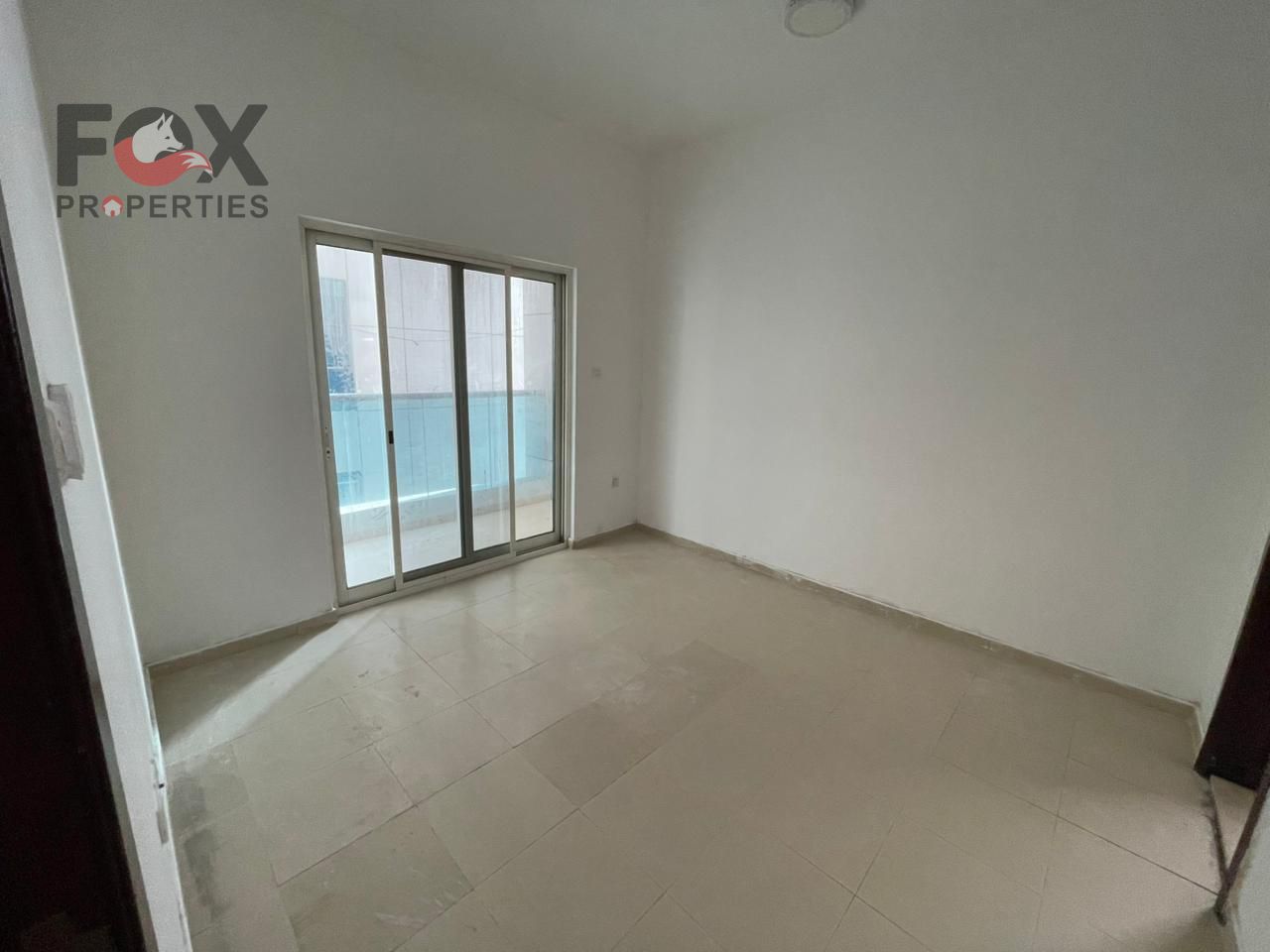 One bedroom and living room for annual rent in City Tower, Ajman, with a prime location, clean finishing, and convenient access to services.