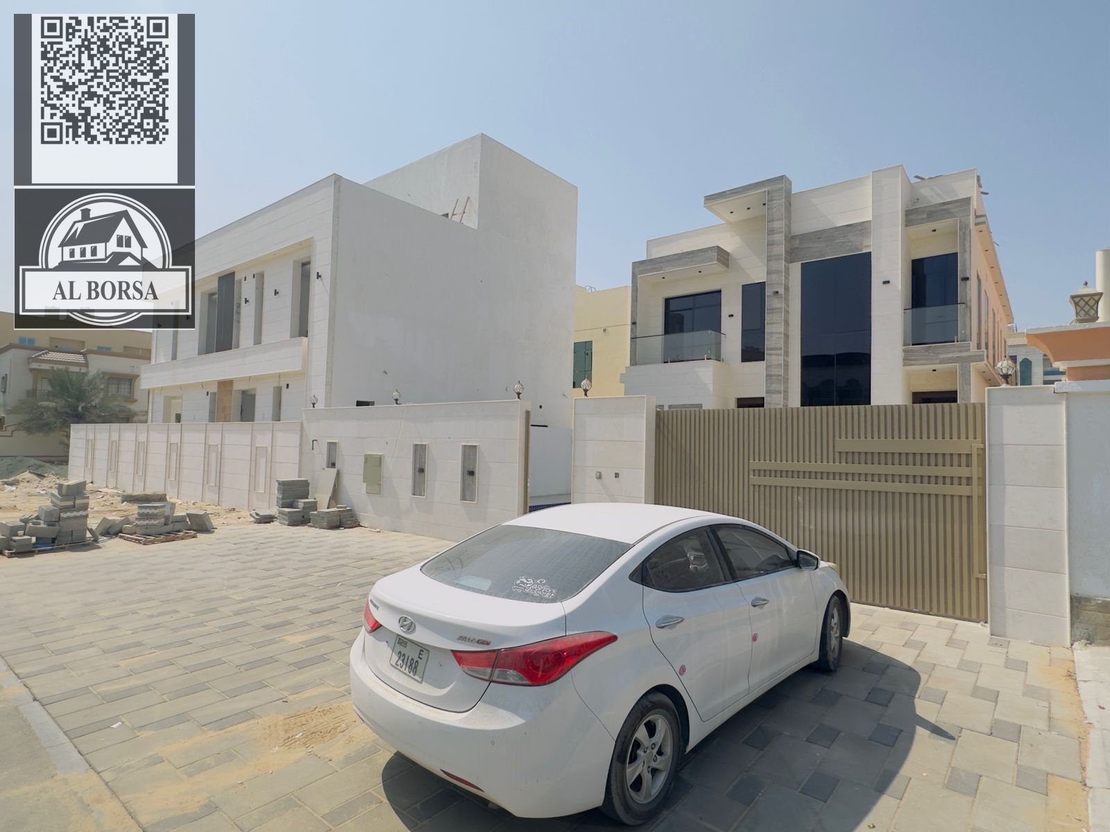 For sale in Al Rawda 2, a villa consisting of 5 master bedrooms with wardrobes, two living rooms, a majlis, and a maid's room.