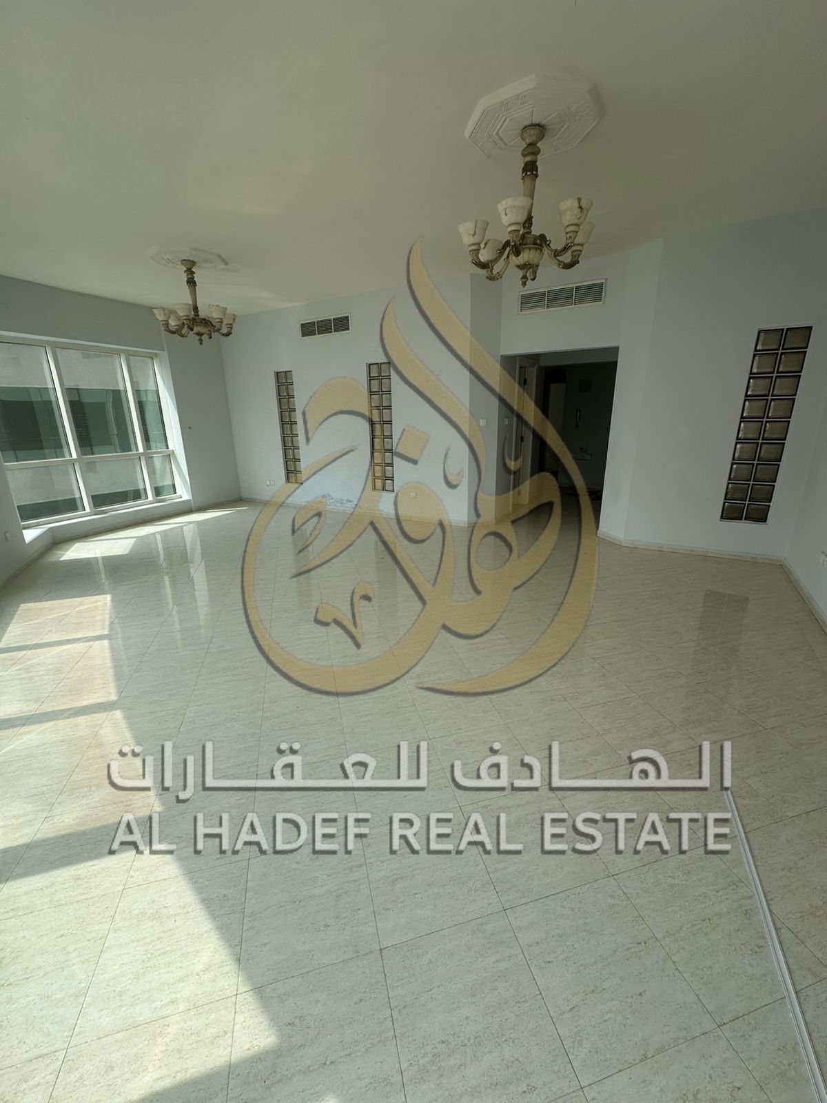 Sharjah Emirate, Al Khan area, two-bedroom apartment available with cash deposit, free maintenance, gym, swimming pool, and free air conditioning