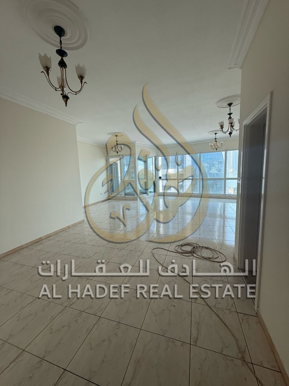 Sharjah Emirate, Al Majaz 2 area, available 3-bedroom apartment with a hall, a maid's room, 4 bathrooms, a balcony with a full view of the lake, a swi