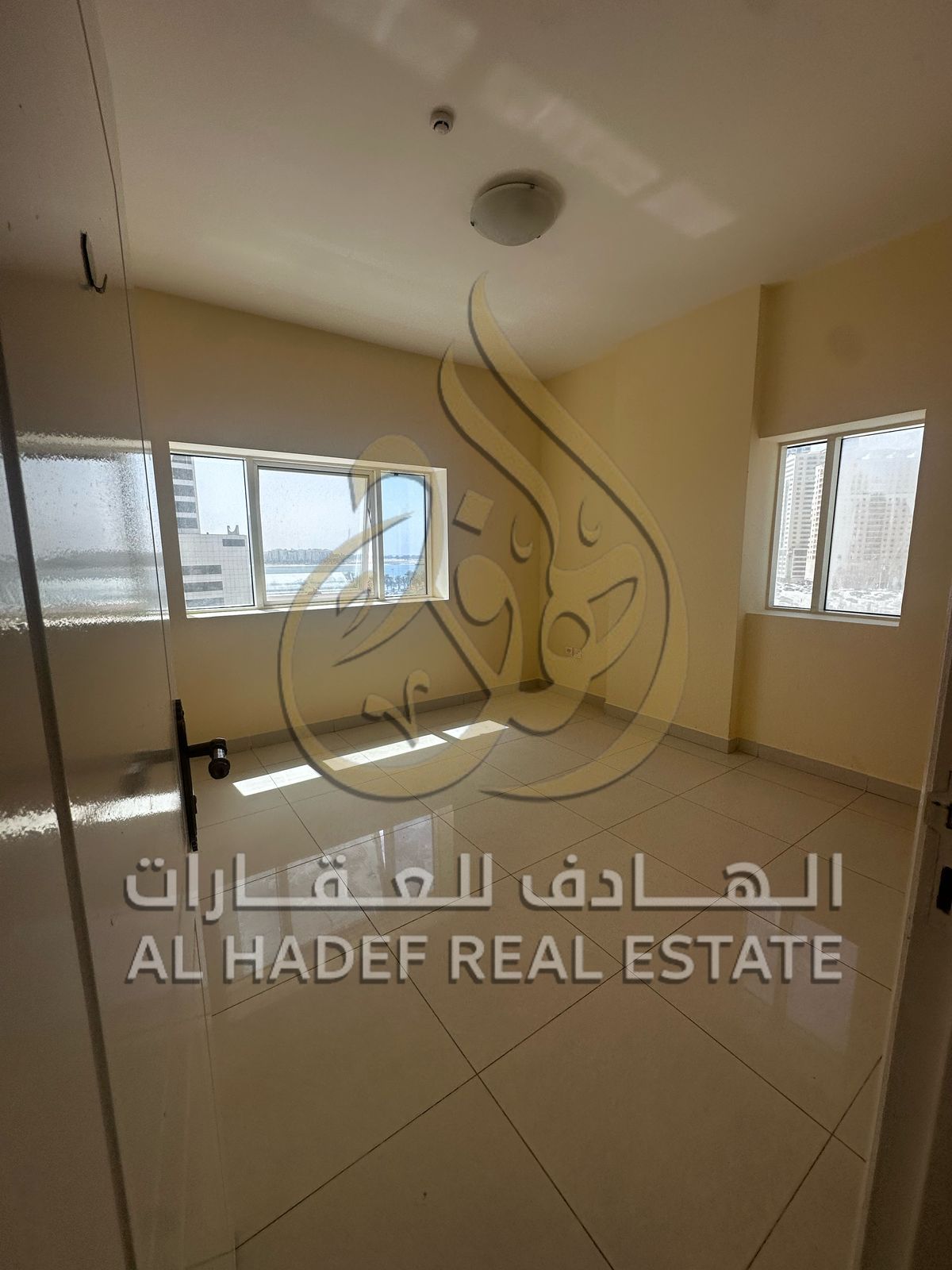 Sharjah Emirate, Al Khan area, a two-bedroom apartment with a hall is available with spacious areas in a family tower monitored by cameras 24 hours a