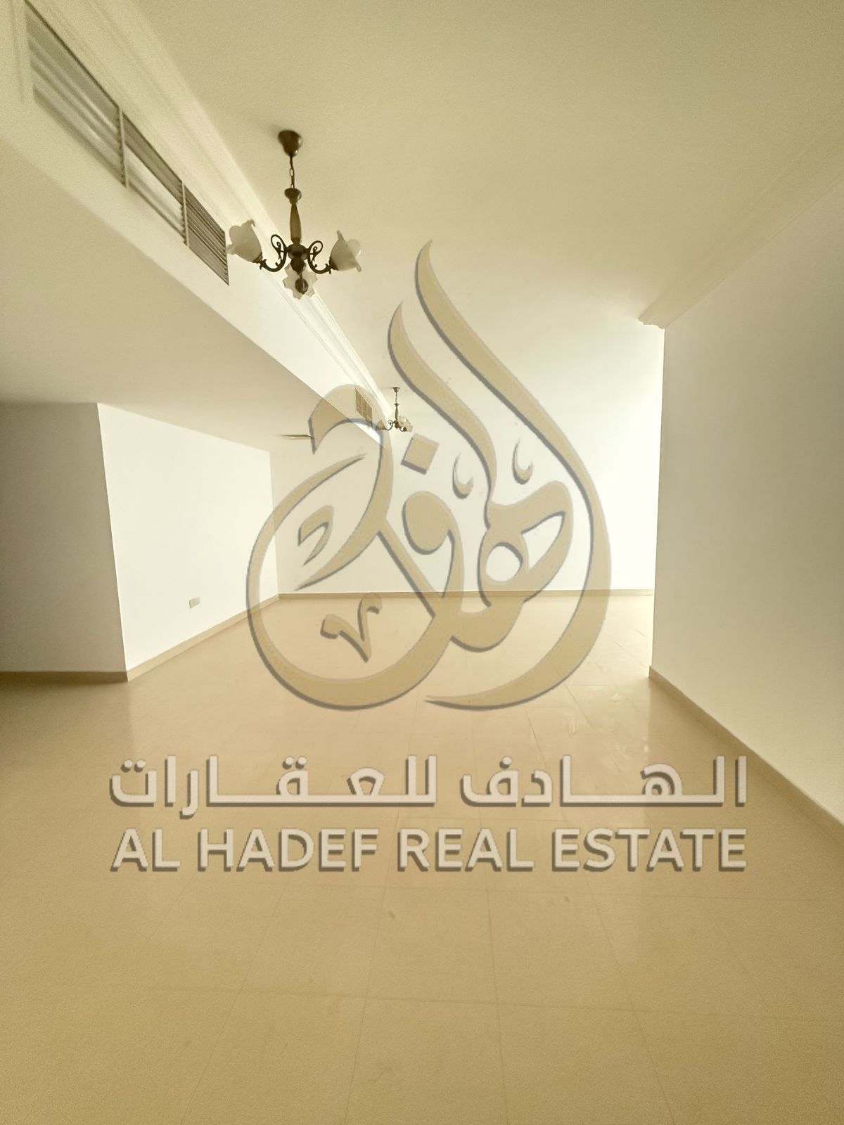 In the Al Taawun area of Sharjah, a spacious apartment is available, featuring 3 bedrooms, a living room, a maid's room, a balcony with a stunning v