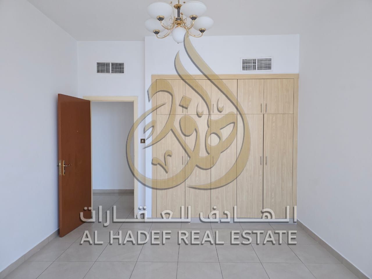 Sharjah Emirate, Al Taawun area, available apartment consisting of two rooms and a hall with a gym, a free swimming pool, and wall safes in a prime lo