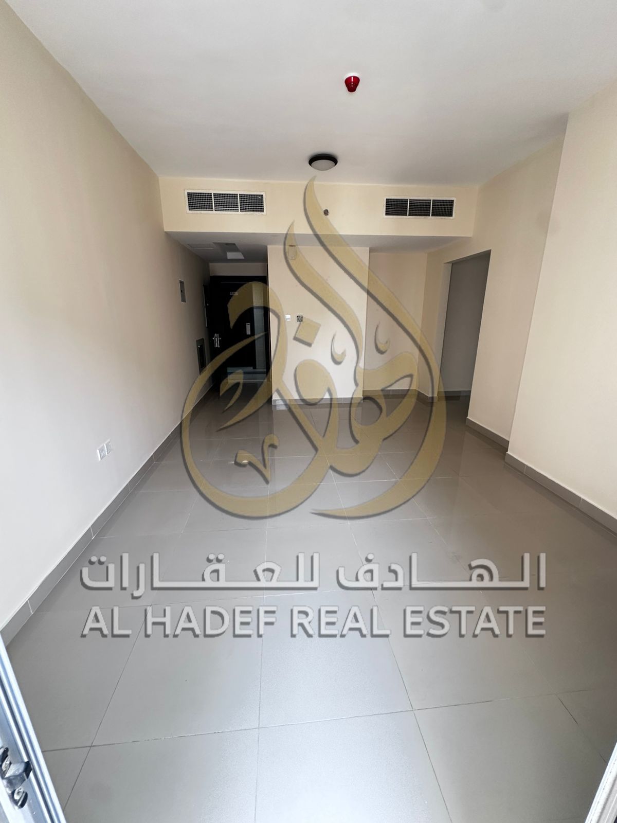 Apartment for annual rent in Al Majaz 3, consisting of two bedrooms, a hall with a balcony, and two bathrooms